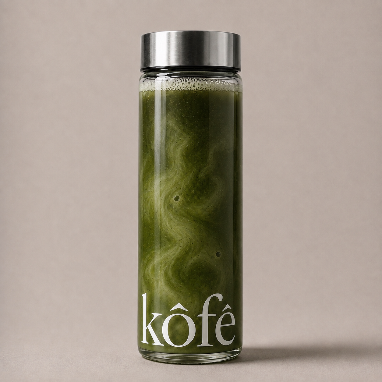ʼkôfē branded glass bottle filled with iced matcha